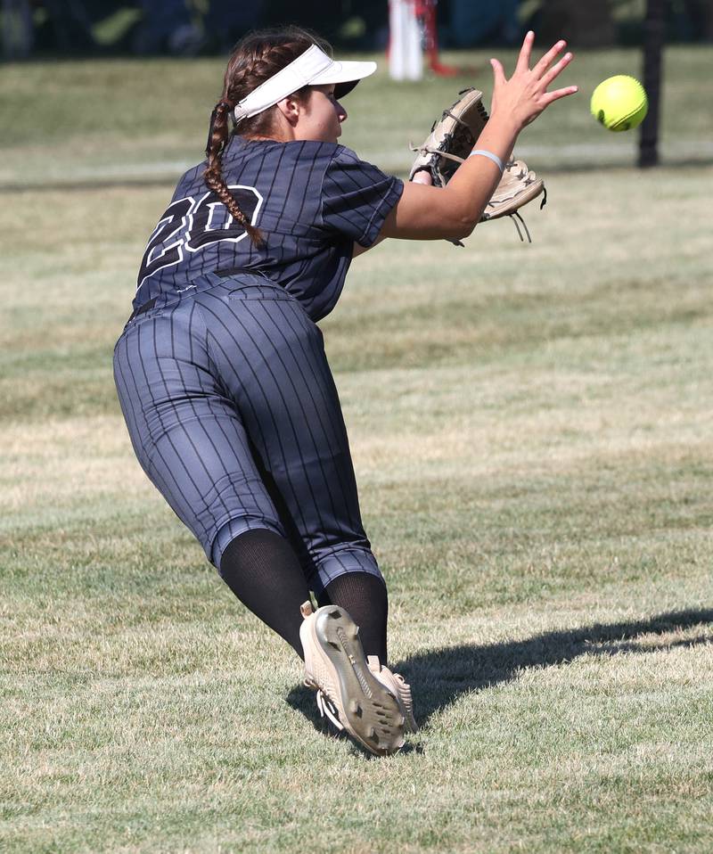 Kaneland's Lexi  Workman makes a diving catch in left field during their Class 3A sectional semifinal against Sycamore Thursday, May 30, 2024, at Sycamore High School.