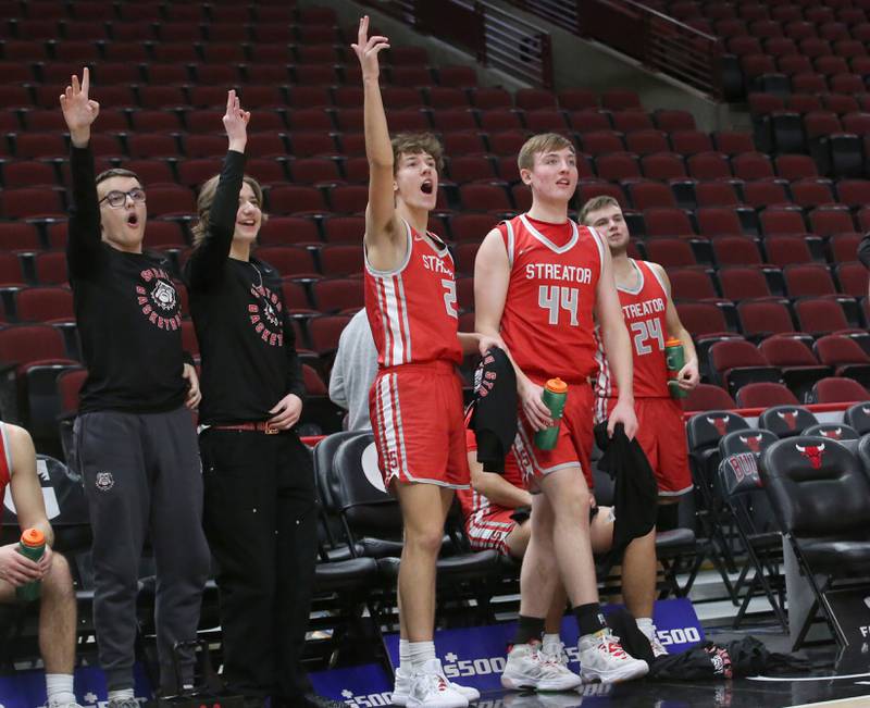 Members of the Streator boys basketball team react as the team plays Seneca during a game on Tuesday, Dec. 21, 2023 at the United Center in Chicago.