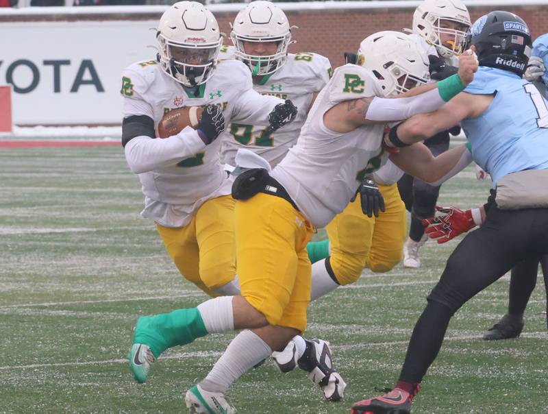 Providence Catholic's Xavier Coleman runs the ball against St. Francis during the Class 5A State championship on Tuesday, Dec. 2, 2025 in Hancock Stadium at Illinois State University in Normal.