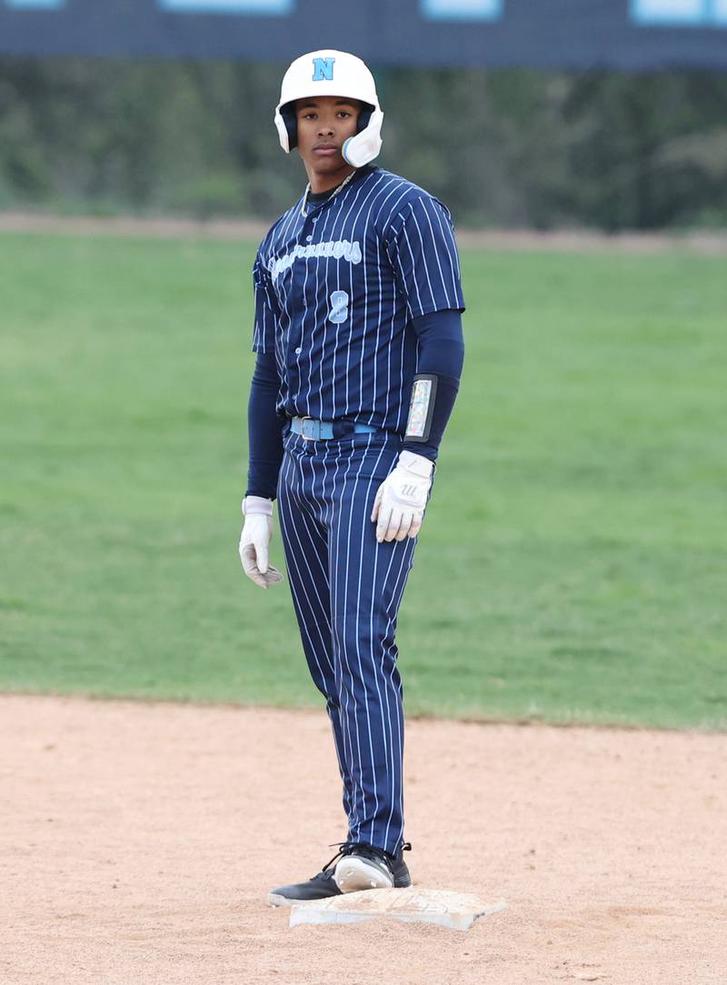 Nazareth's Jeremy Thompson (8) stands at second after a double during the varsity baseball game between Benet Academy and Nazareth Academy in La Grange Park on Monday, April 24, 2023.