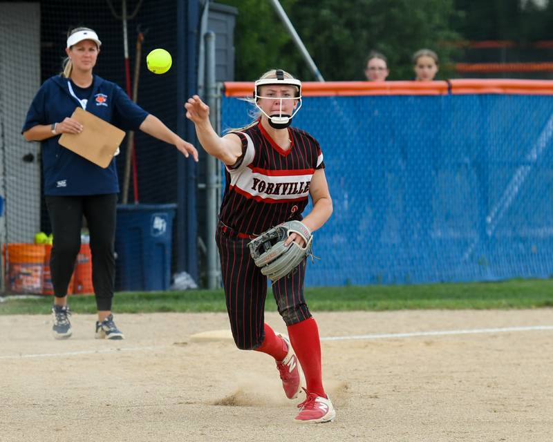 Yorkville's Brooke Ekwinski (2) throws out a runner at first during the sectional semifinals game on Tuesday June 3, 2025, while taking on Oswego held at Oswego High School.
