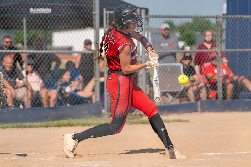 Yorkville's Makenzie Sweeney (4) drives in a run on a single against Wheaton Warrenville South during the Class 4A Oswego softball sectional final game between Yorkville and Wheaton Warrenville South at Oswego High School on Friday, June 2, 2023.