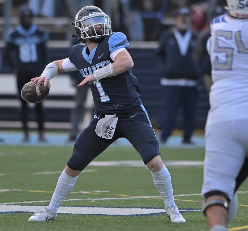 Nazareth quarterback Logan Malachuk throws late in the win against St. Francis in the IHSA Class 5A state semifinal football game in La Grange on Saturday, Nov. 23, 2024.