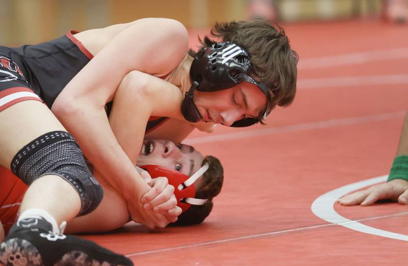 Ottawa's Gavin Creed, pins L-P's Caleb Bjerkaas, during a meet on Thursday Jan. 8, 2026 in Kingman Gymnasium at Ottawa High School.