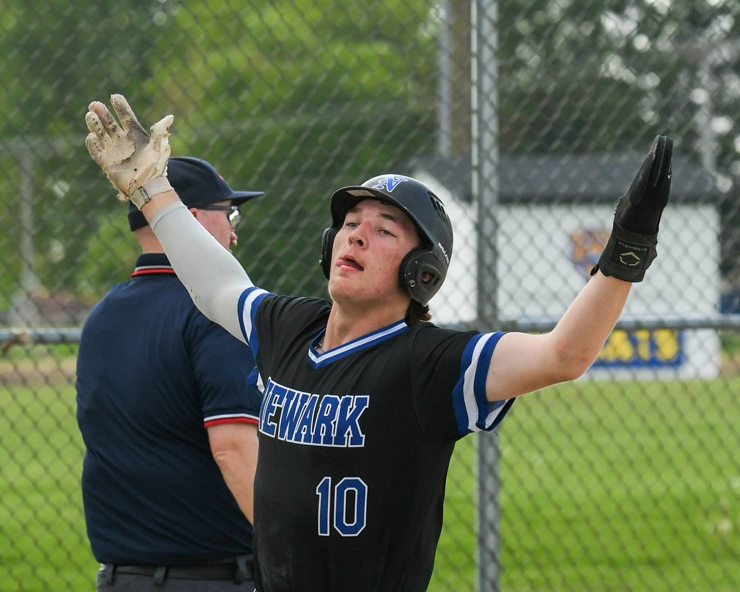 Newark's Toby Steffen (10) celebrates his run during the game on Tuesday May 13, 2025, while traveling to take on Somonauk High School.