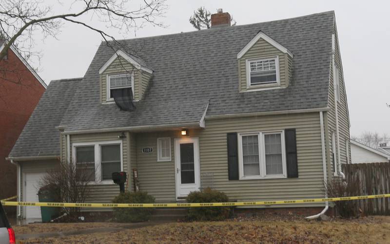 A view of a home surrounded by crime scene tape in the 1100 block of East Elm Street on Tuesday, March 4, 2025 in Streator.