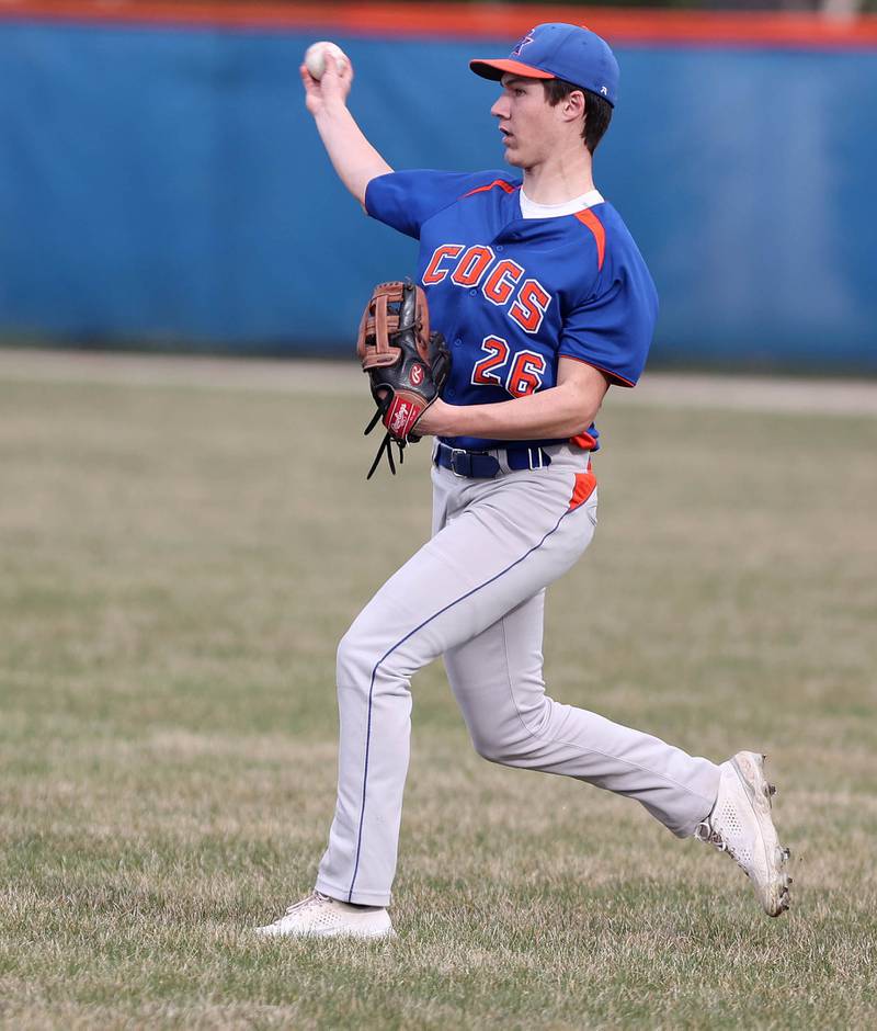 Genoa-Kingston's Nathan Skarzynski gets the ball back into the infield after a Winnebago base hit during their game Tuesday, April 12, 2022, at Genoa-Kingston High School.