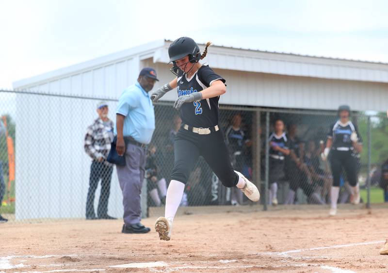 Clifton Central's Emily Ponton reaches home on an inside the park home run during Central's 9-3 victory over St. Anne in the Class 1A Dwight Regional quarterfinal game at Central High School.