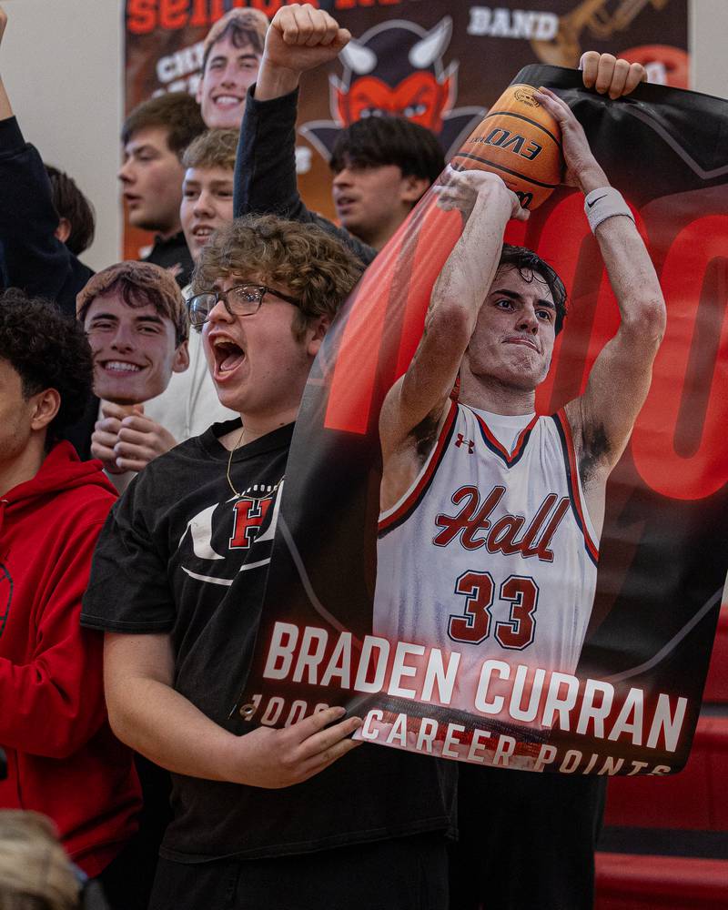 Evan Vecchia reacts after Braden Curran (33) of Hall scores 1,000th career point in game against St. Bede on Saturday, January 31, 2026 at Hall High School in Spring Valley.