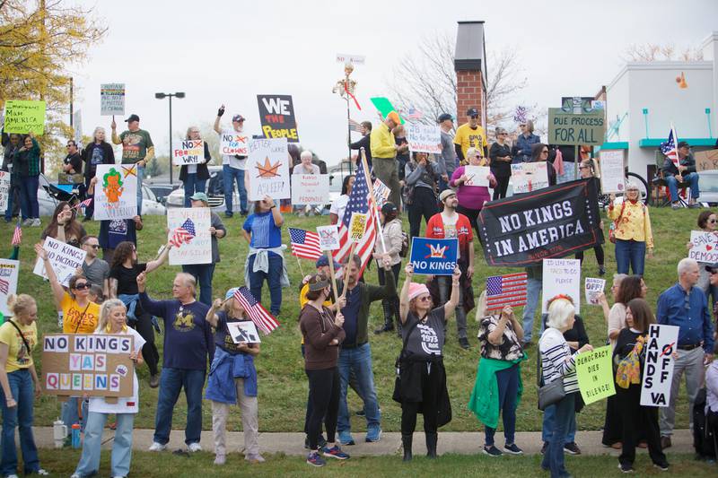 Locals gather at the NO Kings rally along Randall Rd. on Saturday, Oct.18,2025 in Geneva.