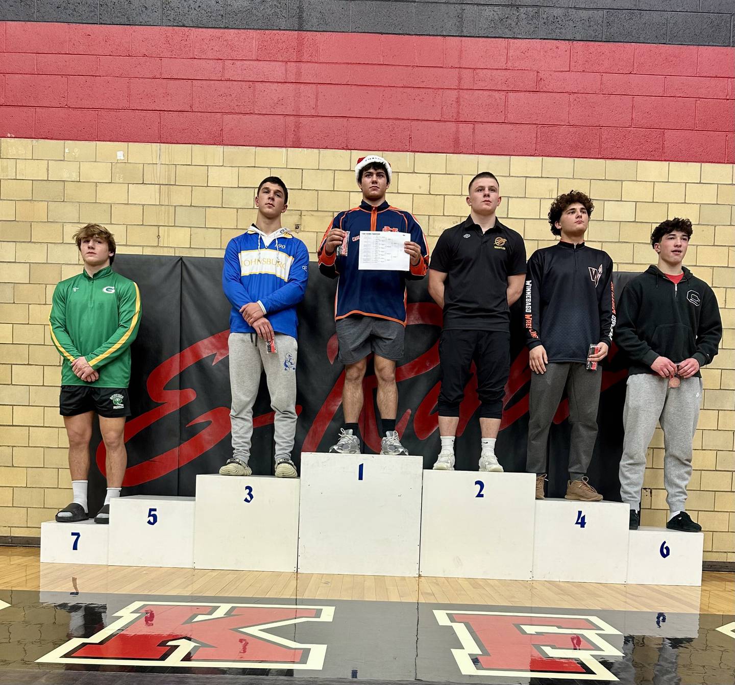 Johnsburg's Duke Mays and Richmond-Burton's Blake Livdahl (left to right) medaled in third and second, respectively, at the E-Rab Giardini Invitational at Rockford East on Saturday.