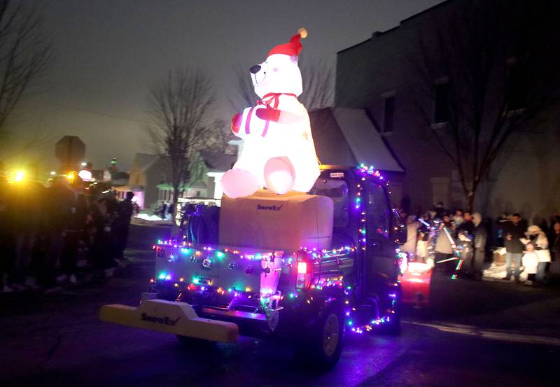 A polar bear inflatable greets crowds during A Very Merry Huntley on Saturday, Dec. 6, 2025.