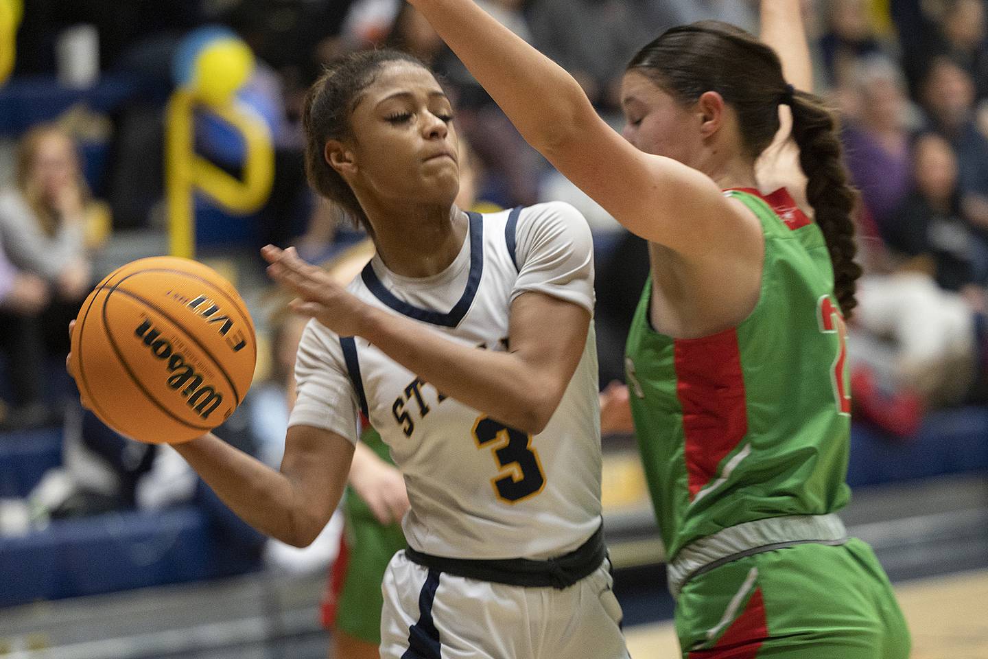 Sterling’s Delali Amankwa looks to pass against LaSalle-Peru’s Brianna Rupert Tuesday, Dec. 3, 2024, at Sterling High School.