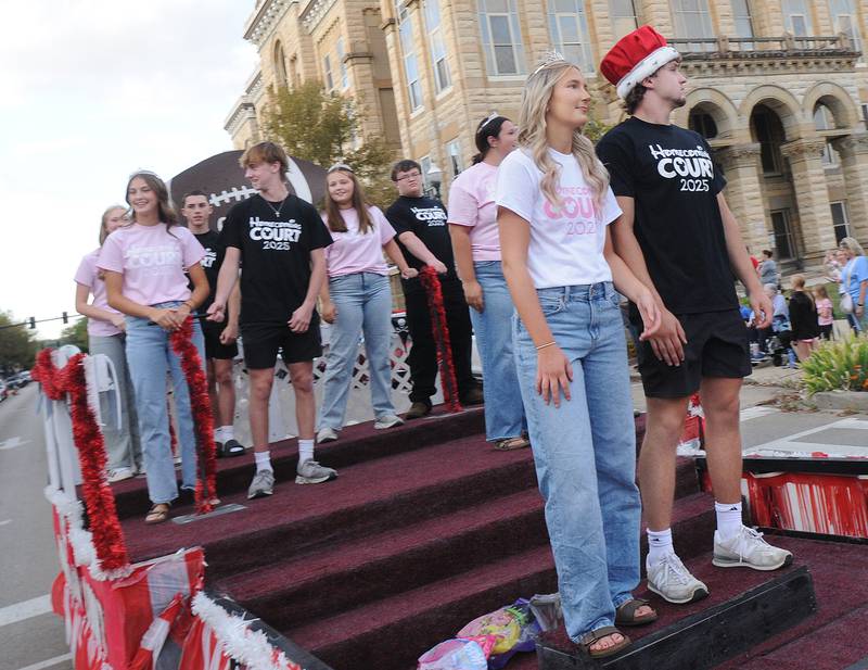 The 2025 Ottawa High Homecoming Court ride upon their float down LaSalle St in Ottawa Wednesday evening during the school’s annual Homecoming Parade.