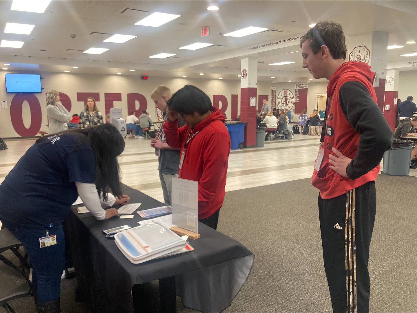 Lockport Township High School students registers to vote during a voter registration event held at the East Campus on Tuesday, Jan. 30.  Representatives from the Will County Clerk’s Office were present for students to sign up during their lunch periods.