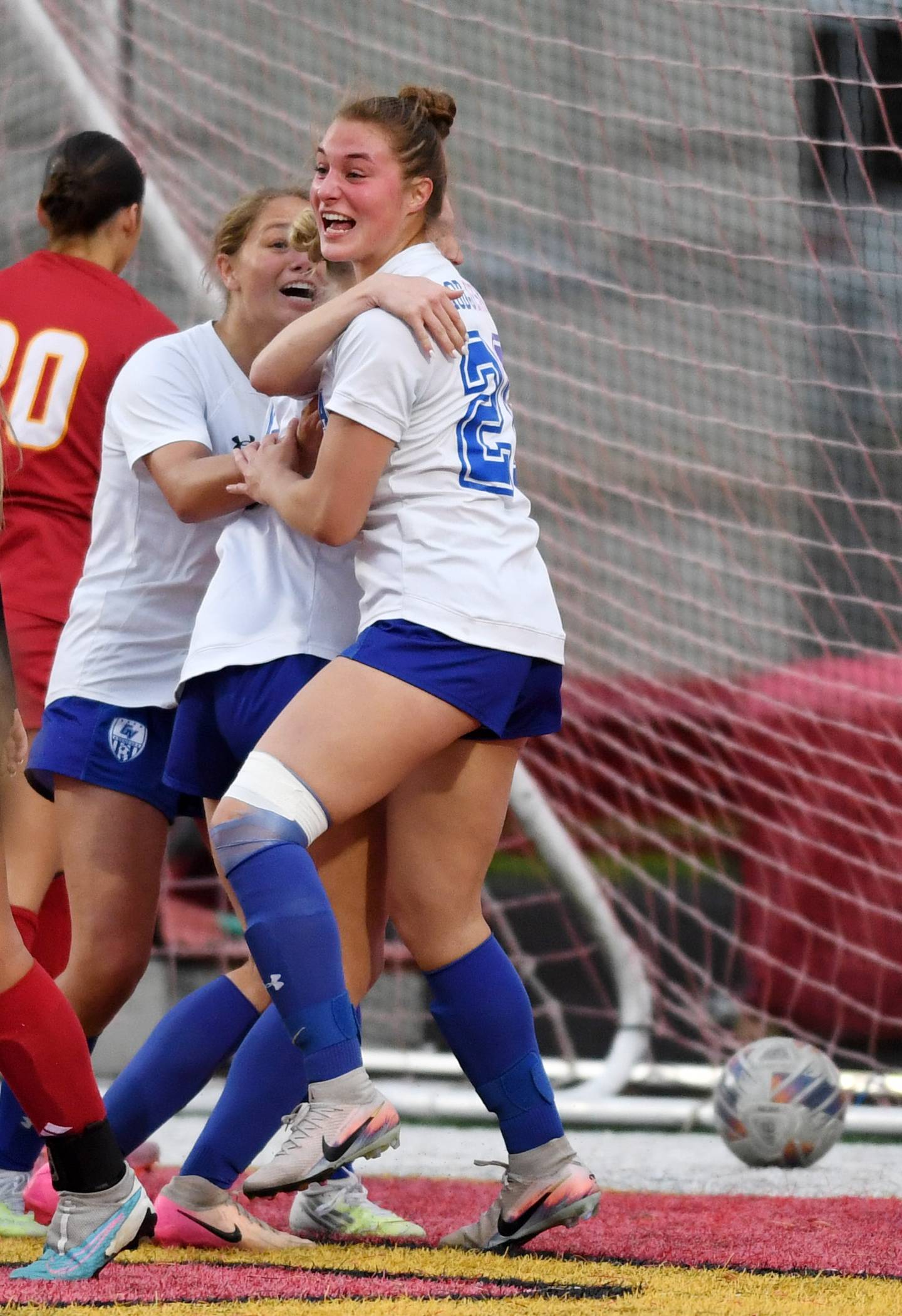 Geneva’s Tegan Modjeski, right, celebrates a first-half goal with hear teammates during Tri-Cities soccer night on Tuesday, May 5, 2026 at Batavia.