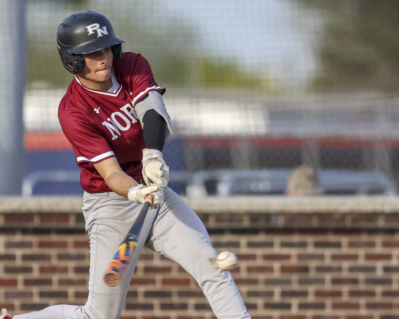 Plainfield North's Daneil Smith (18) lines up a pitch during baseball game between Plainfield North at Oswego, Thursday, April 24, 2025 in Oswego.