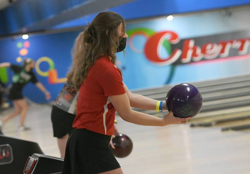Oregon's Ava Wight looks down the alley as she competes in the state bowling finals at the Cherry Bowl in Cherry Valley on Saturday.