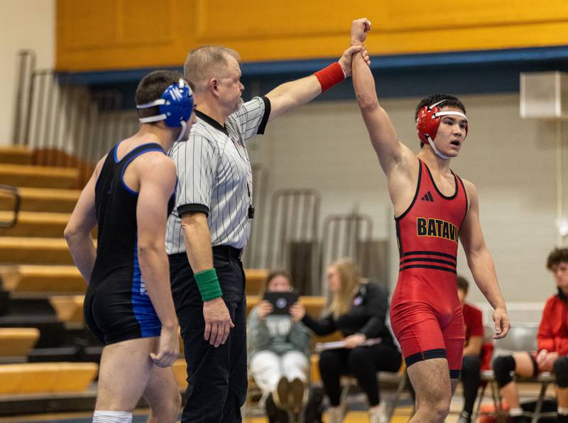 Batavia’s Shane Fukomoto, right, wins his match against Geneva’s Ali Shabbir at Geneva High School on Thursday, Dec. 19, 2024.