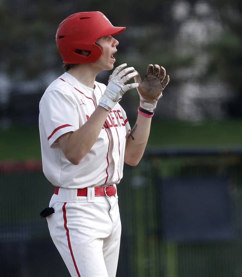 Huntley's Tyler Jakubowski reacts to being forces out on a caught fly ball during a Fox Valley Conference baseball game against Hampshire on Monday, April 28, 2025, at Huntley High School.