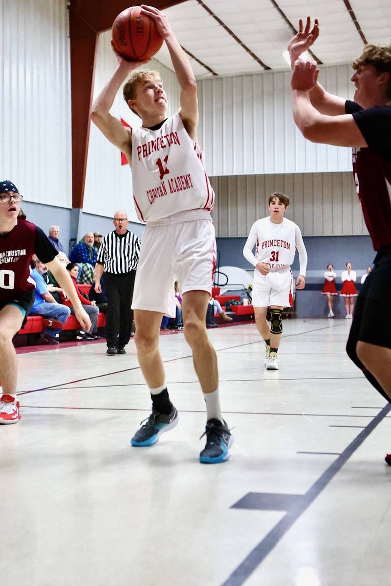 Princeton Christian Academy's Andrew Gibson shoots against Ottawa Christian Academy Tuesday at Howard Hoffman Memorial Gym. The Eagles won 57-42.