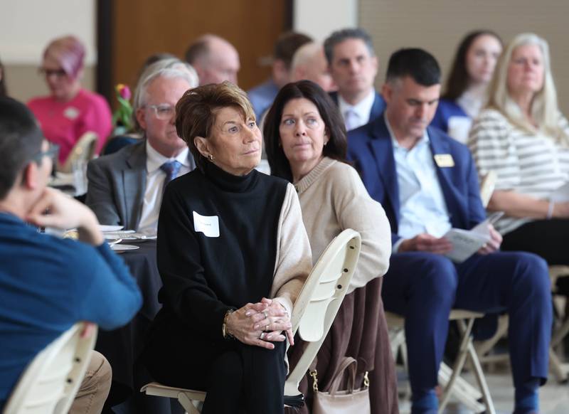 Attendees listen to an award recipient Thursday, March 5, 2026, during the Sycamore Chamber of Commerce Annual Meeting in Memorial Hall at St. Mary's Catholic Church in Sycamore.