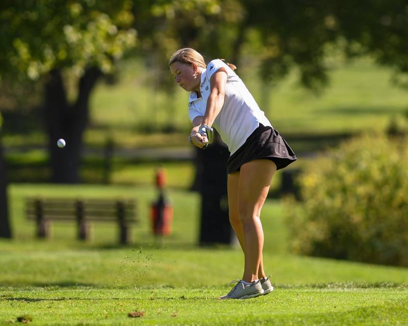 Caroline Schult of Wheaton Warrenville South tees off during the DuKane conference meet on Tuesday Sept. 23, 2025, held at Phillips golf course in Aurora.