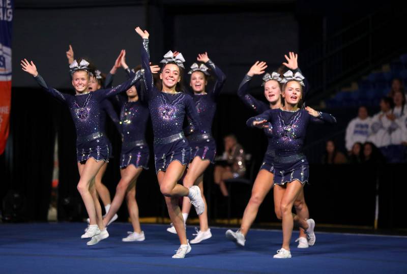 Members of the Cary-Grove cheerleading team compete in the medium team division of the IHSA State Finals on Saturday, Feb. 8, 2025 at Grossinger Motors Arena in Bloomington.