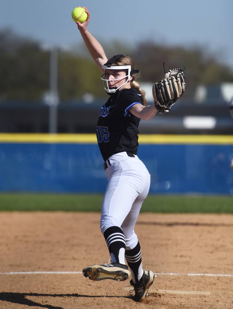 St. Charles North pitcher Paige Murray throws to a Wheaton North batter during Wednesday’s softball game in Wheaton.