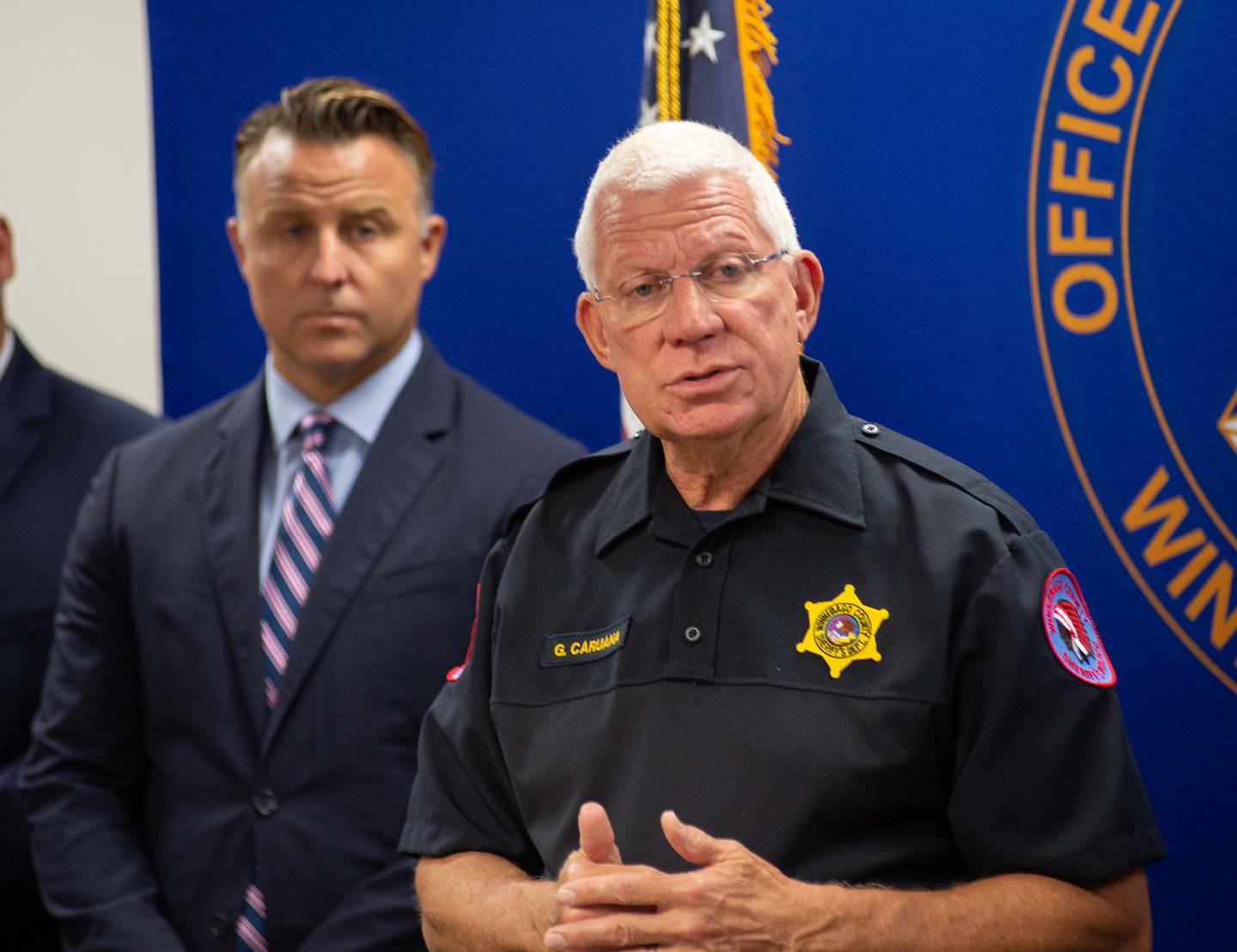 Winnebago County State's Attorney J. Hanley, left, and Winnebago County Sheriff Gary Caruana discuss details leading to charges against Jonathan Van Duyn for the murder of Michelle Arnold-Boesiger during a news conference in the Winnebago County courthouse on Tuesday, Aug. 10, 2021. Winnebago County authorities believe Arnold-Boesiger was murdered in mid-November 2020.