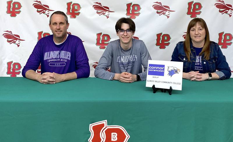 La Salle-Peru's Connor Noramczyk (center) signed to play golf at IVCC. He was joined by his dad, Dan (left) and mom, Jennifer.