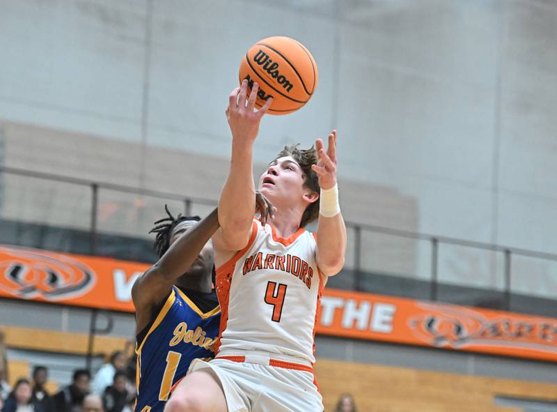 Lincoln-Way West's Ethan Swanson (4) in action during the 4A Lockport Regional game against Joliet Central on Monday, FEB. 23, 2026, at New Lenox.