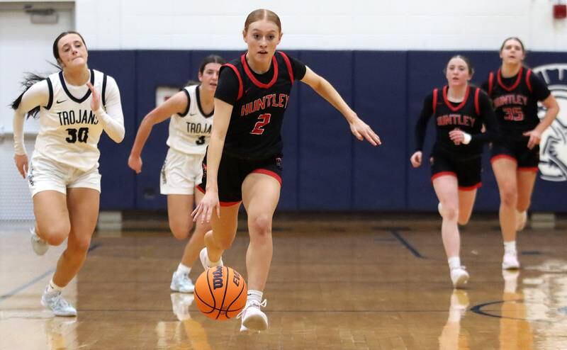 Huntley’s Avery Seuss leads a fast break in varsity girls basketball on Friday, Jan. 24, 2025, at Cary-Grove High School in Cary.