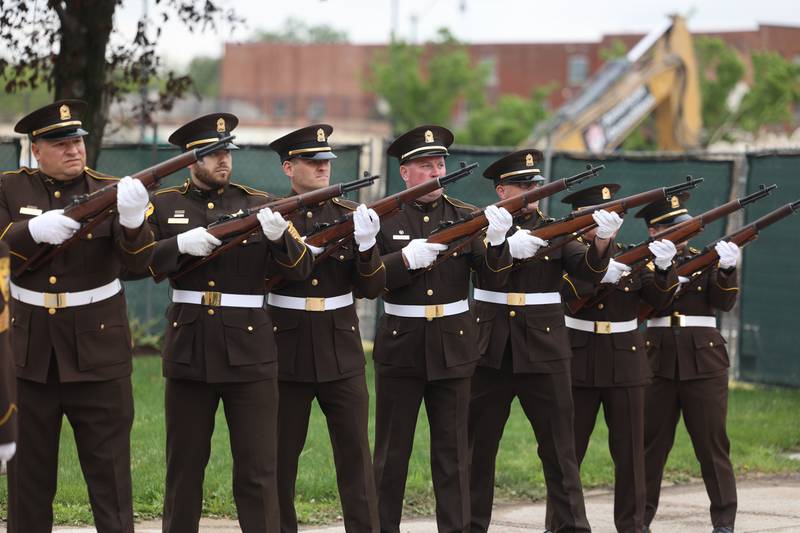 Will County Sheriff’s Office Color Guard perform the Rifle Salute during the Will County Law Enforcement Memorial ceremony on Thursday, May 9, 2024 in downtown Joliet.