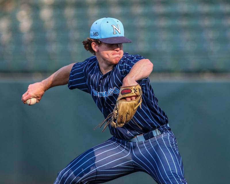 Nazareth's Finn O'Meara (32) winds up to throw a pitch during Class 3A Crestwood Supersectional game between Lindblom at Nazareth.  June 5, 2023.