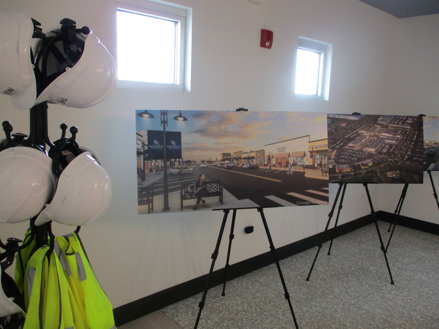 Poster boards inside Cullinan Properties construction trailer at its Rock Run Collection development in Joliet provide artist renderings on how the project may look when built. May 6, 2026
