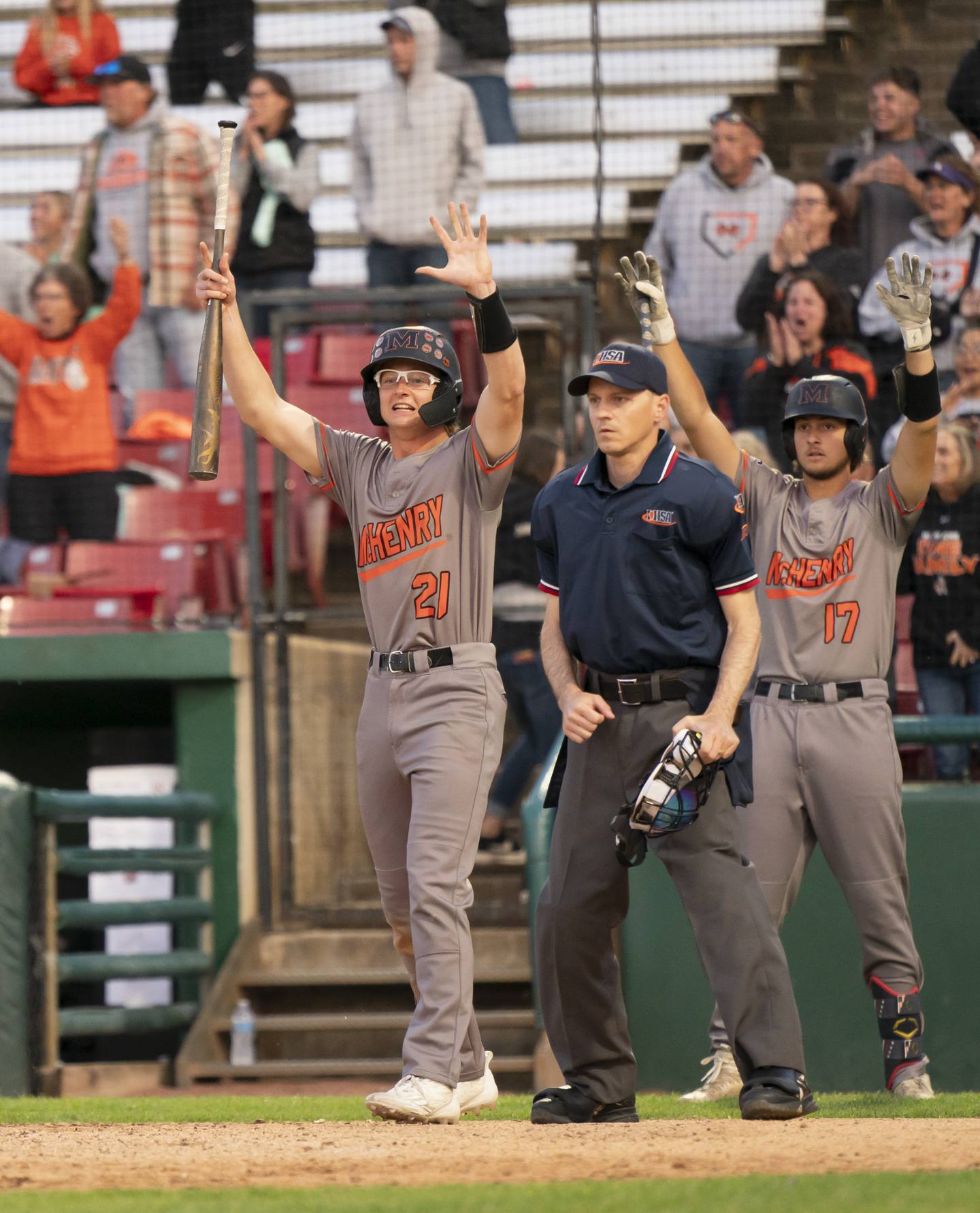 McHenry's Kaden Wasniewski, left, celebrates a run with teammate Donovan Christman during the boys baseball Class 4A Kane County Cougars Supersectional against South Elgin on Monday, June 9, 2025 at Northwestern Medicine Field in Geneva. Ryan Rayburn for Shaw Local