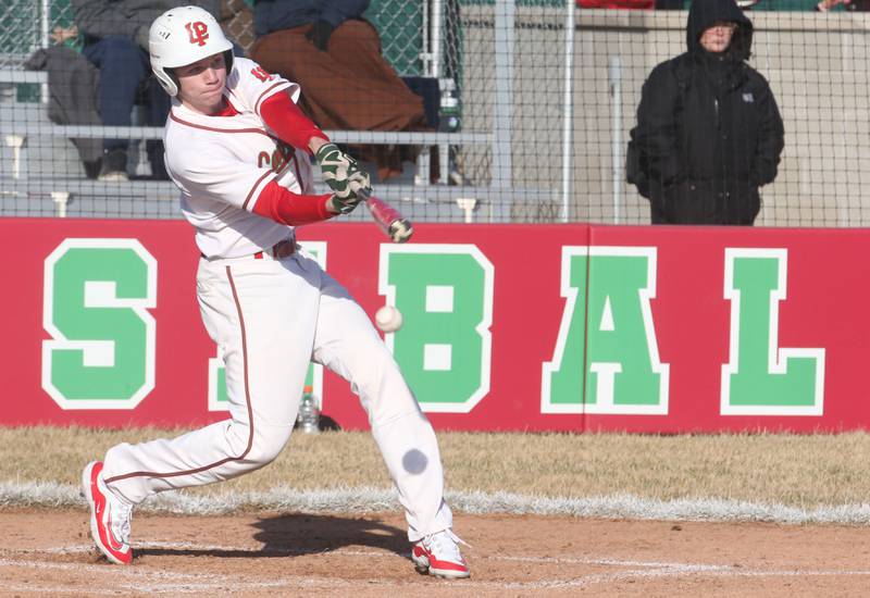 L-P's Braylin Bond strikes out swinging against Pontiac on Monday, March 24, 2025 at Huby Sarver Field inside the L-P Athletic Complex in La Salle.