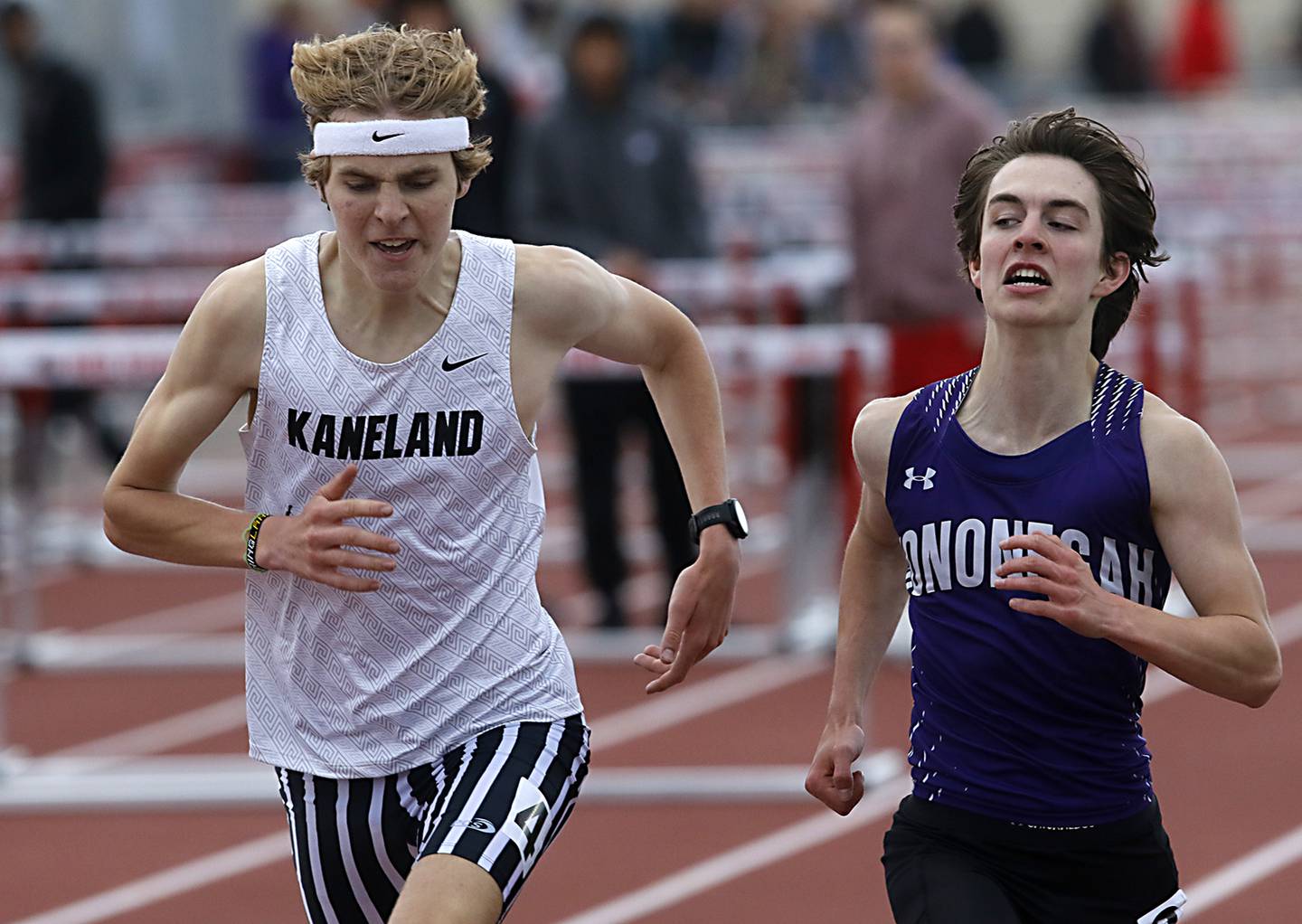 Kaneland’s Evan Nosek and Nononegah’s Landon Samuelson races to the finish line in the 3200 meter run during the Huntley IHSA Class 3A Boys Sectional Track and Field Meet on Thursday, May 22, 2025, at Huntley High School.