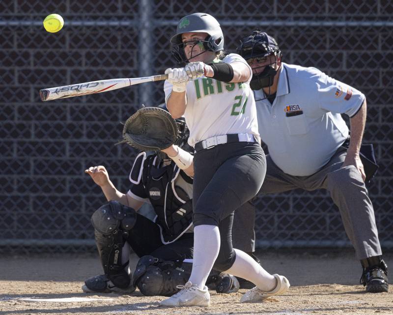 Emma Mino makes contact against the WFC Warriors in April at Seneca High School.