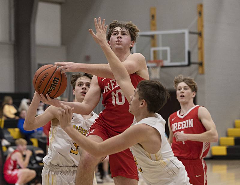 Oregon’s Keaton Salsbury puts up a shot against AFC Wednesday, Nov. 29, 2023 in Ashton.