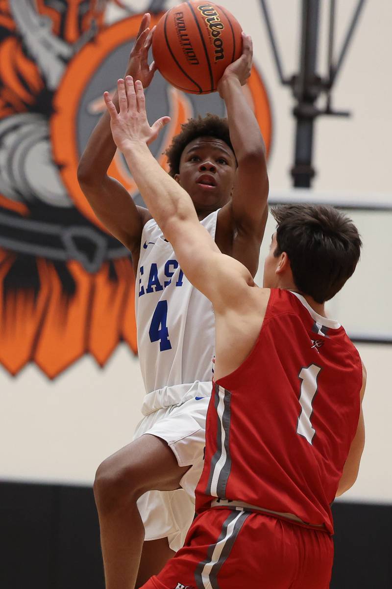 Lincoln-Way East’s BJ Powell puts up a shot against Hinsdale Central in the Lincoln-Way West Warrior Showdown on Saturday January 28th, 2023.