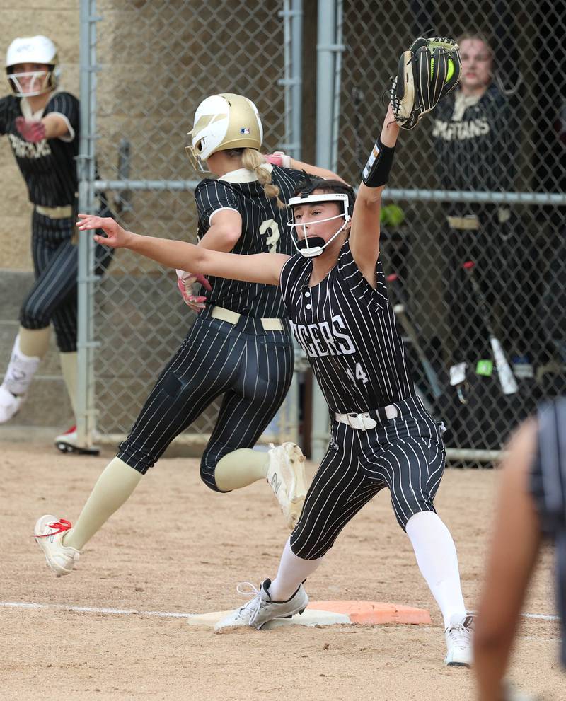 Sycamore's Faith Heil beats the throw to Crystal Lake Central's Lily Perocho for an infield single Tuesday, June 3, 2025 during their Class 3A sectional semifinal game at Sycamore High School.
