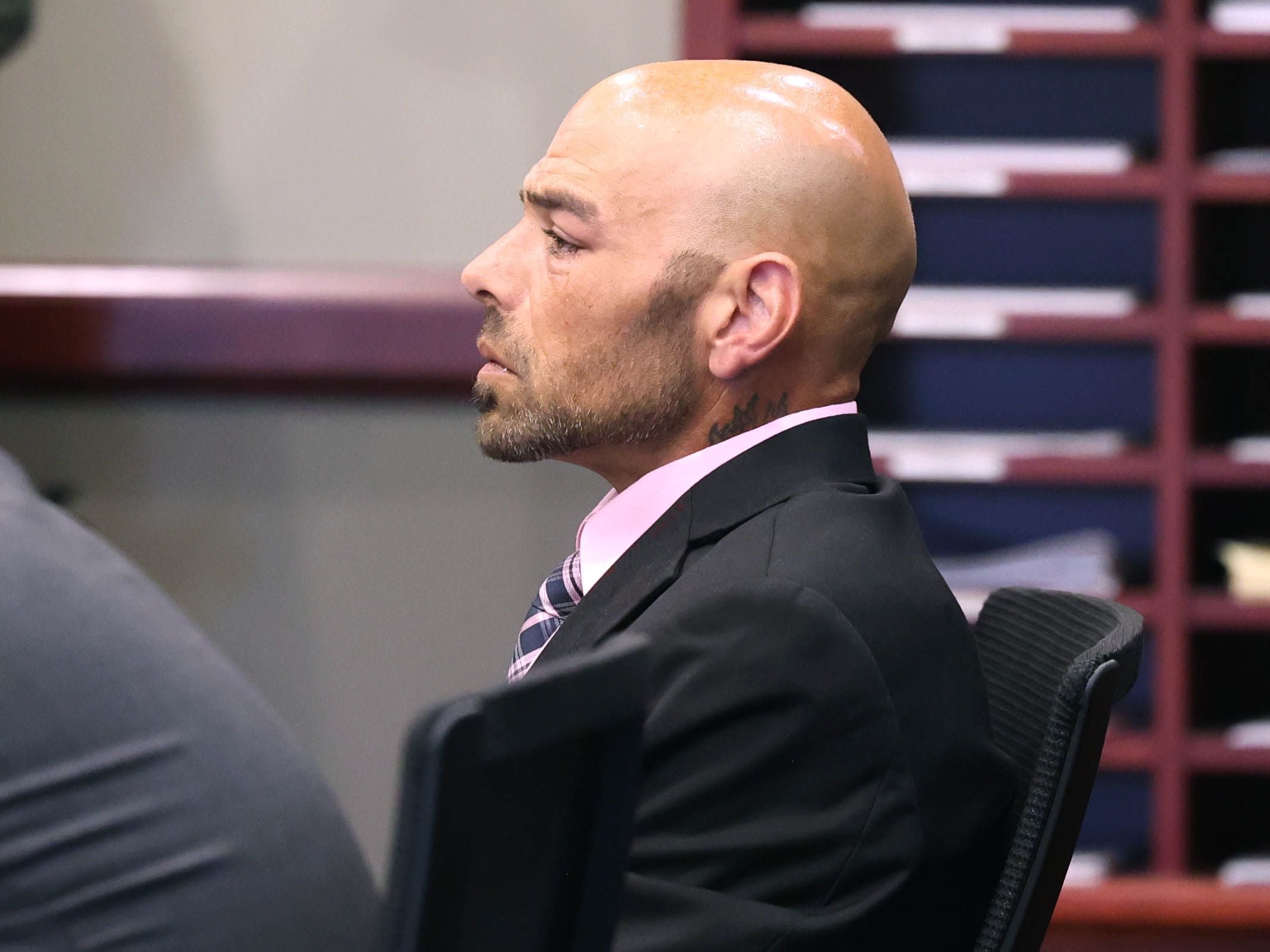 Nathan P. Sweeney listens as Circuit Court Judge Marcy Buick sentences him Tuesday, Aug. 26, 2025, at the DeKalb County Courthouse in Sycamore. Sweeney received the maximum 14 years for driving under the influence and causing the 2024 crash that killed DeKalb County sheriff’s deputy Christina Musil.