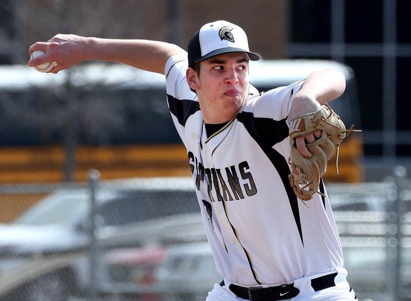 Sycamore's Cal Harbecke delivers a pitch during their game against Byron Wednesday, March 26, 2025, at DeKalb High School. Sycamore’s home field was damaged in last week’s storms so today’s game was played on DeKalb’s field.