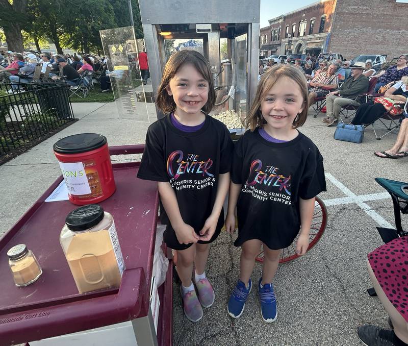 Emmie and Lily Nicholson, ages 9 and 7, of Mt. Morris were busy popping popcorn for the. Mt. Morris Senior & Community Center at the Mt. Morris Jamboree music concert on Friday, June 20, 2025. The free evening concerts are held on Fridays through the summer on the Campus in downtown Mt. Morris.