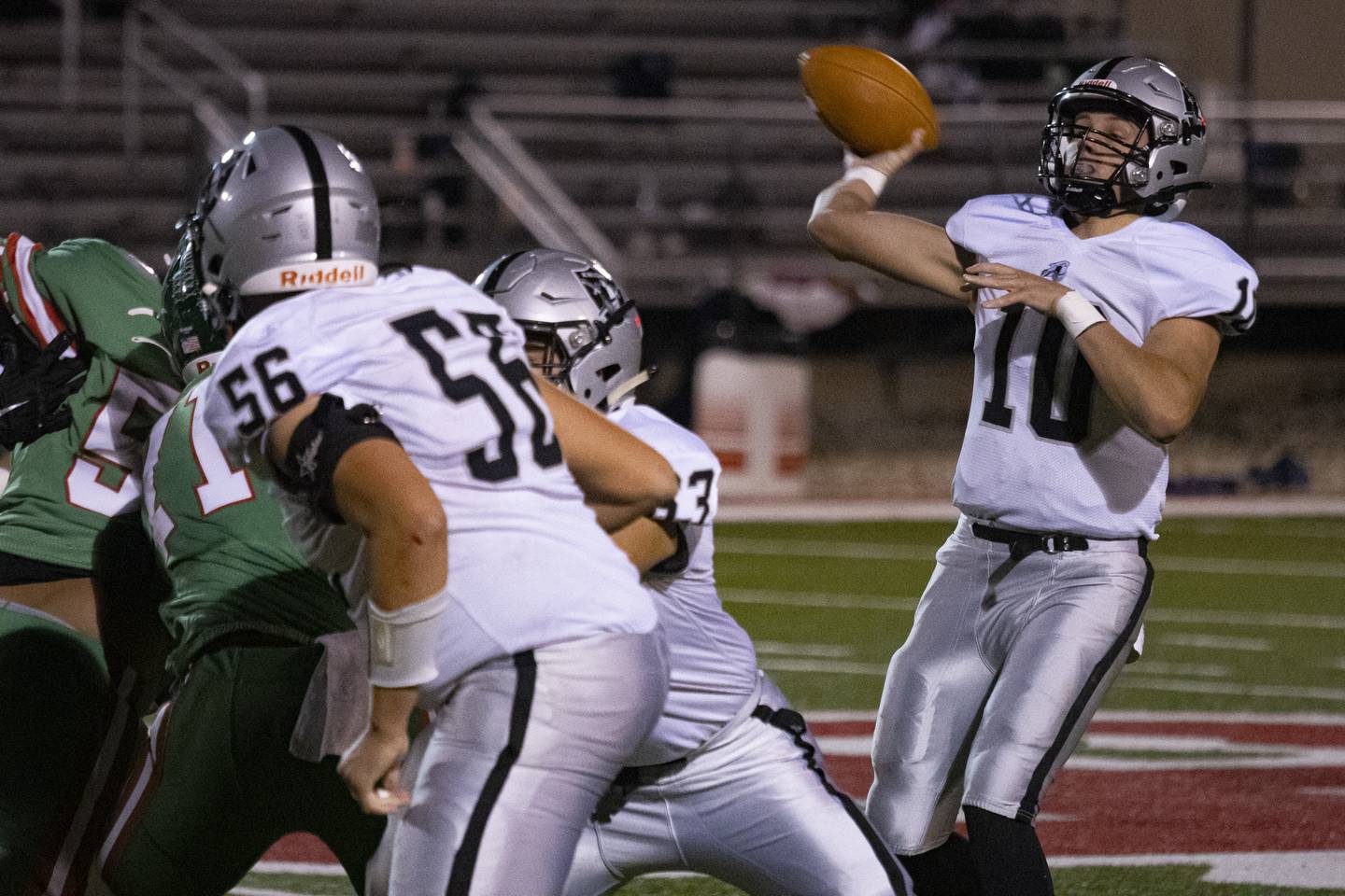 Kaneland quarterback Troyer Carlson throws a pass against La Salle-Peru at Howard Fellows Stadium on Oct. 20, 2023.