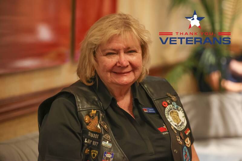 Denise Carson, an Army veteran and an ambassador for Honor and Remember, poses for a photo at the Salute to Armed Forces event at the Double Tree in Alsip on Wednesday, Oct. 11, 2023.