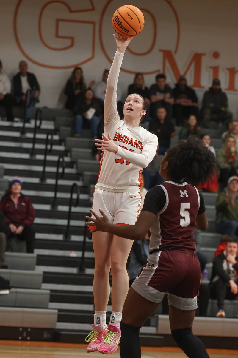 Minooka’s Madelyn Kiper puts up a shot against Moline in the Class 4A Minooka Regional championship game on Thursday, Feb. 19, 2026 in Minooka.