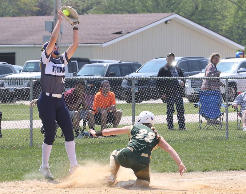Annawan/Wethersfield's Paige Huffman makes a catch at third base as St. Bede's Ella Hermes slides into the bag safely in the Class 1A Regional final game on Saturday, May 20, 2023 in Annawan.